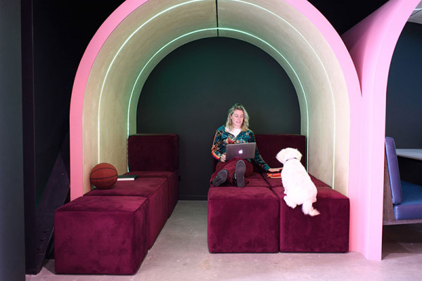 Kat seated in the funky work tunnel at Wrestler Kat seated in the funky work tunnel at Wrestler